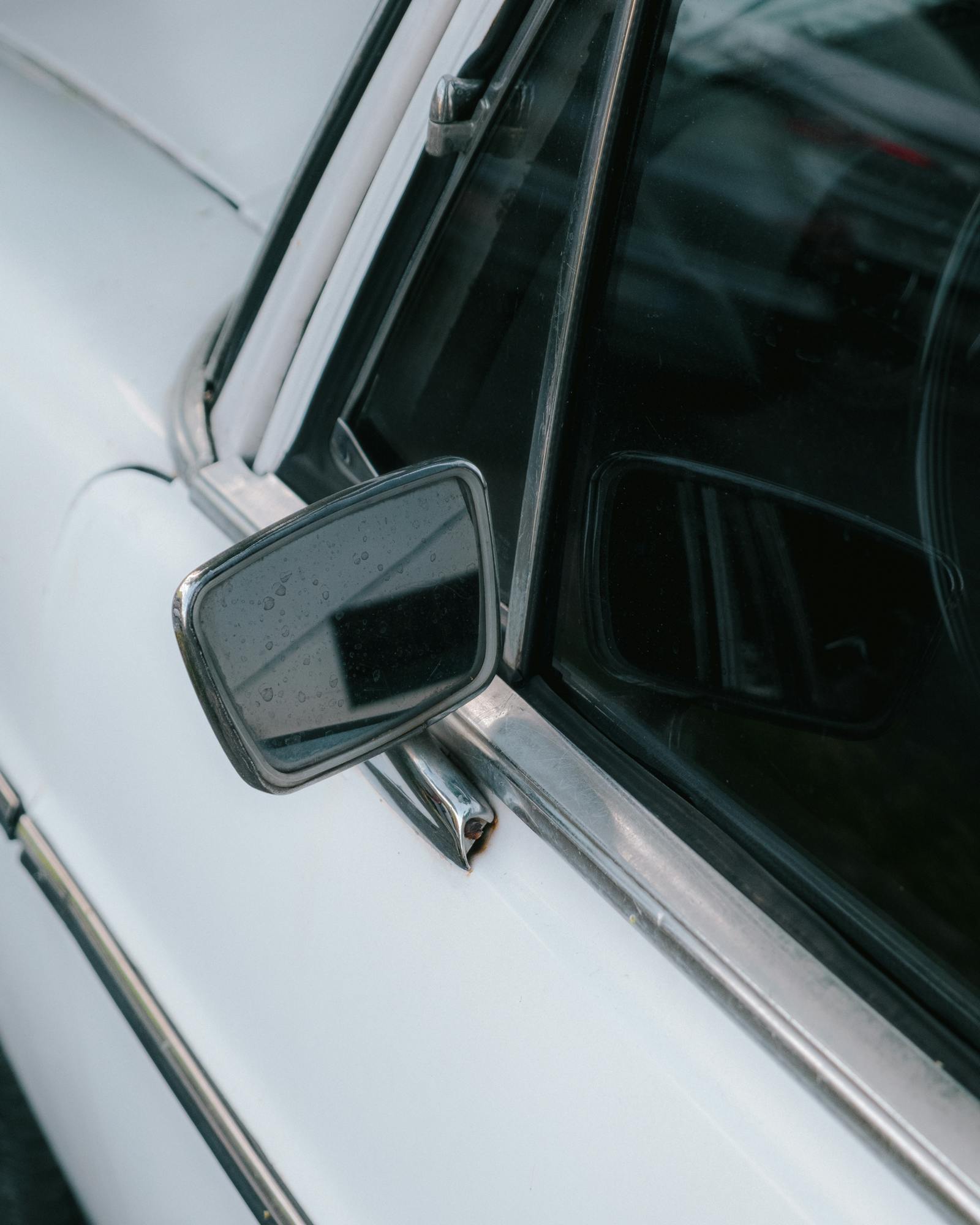 Wing mirror on a UK vehicle, side profile